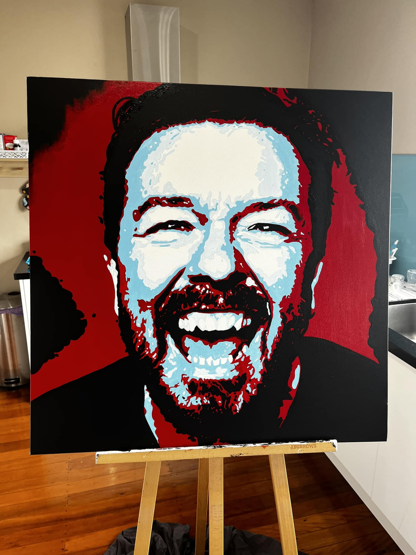 Laughing portrait in red, black and pale blue — acrylic on canvas