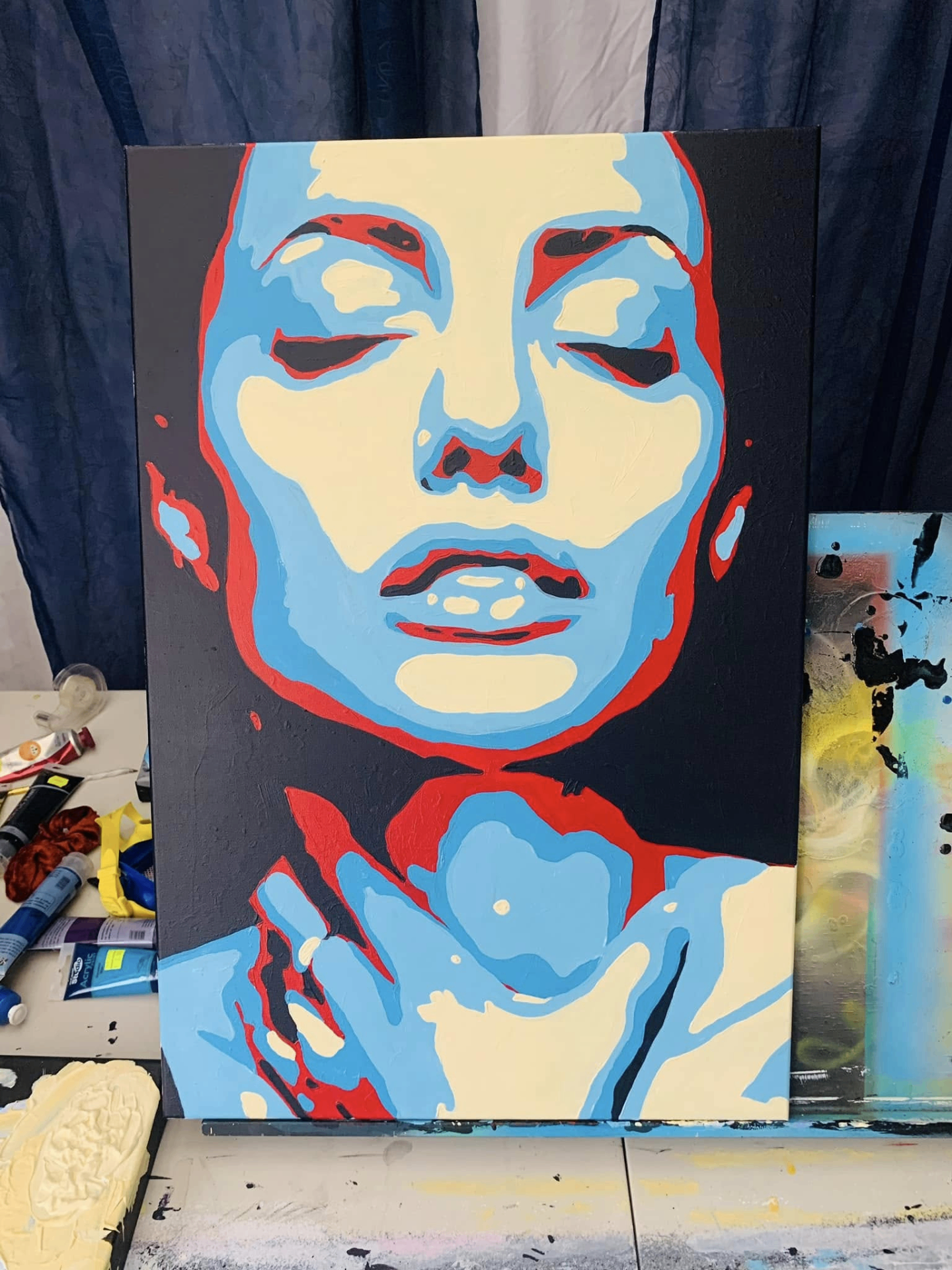 Bold pop-art portrait in blue, cream and red — acrylic on canvas